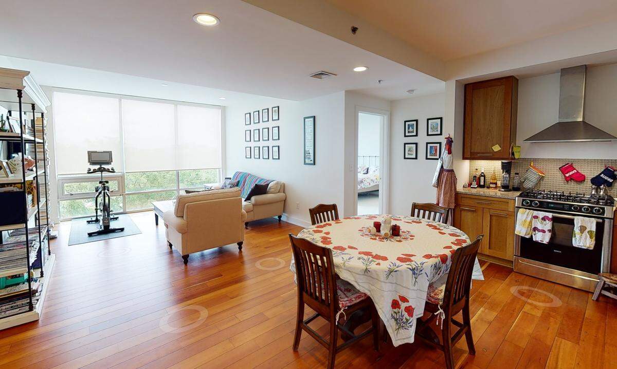 Two-bedroom, two-bathroom 5th floor condominium with 1,206 square feet is in the University of North Carolina campus area near West Franklin Street at 601 East Rosemary Street #502.