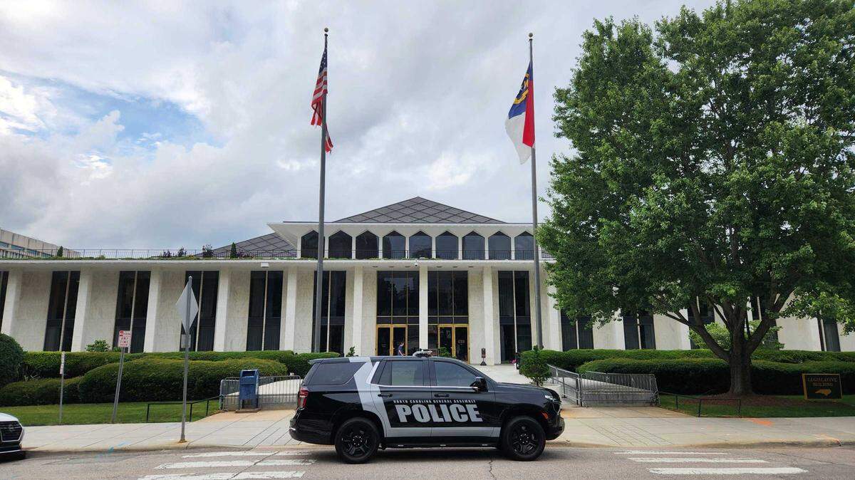 The North Carolina Legislative Building in downtown Raleigh, where the General Assembly convenes, photographed on Tuesday, June 10, 2025, with a General Assembly Police Department vehicle is parked out front on Jones Street.