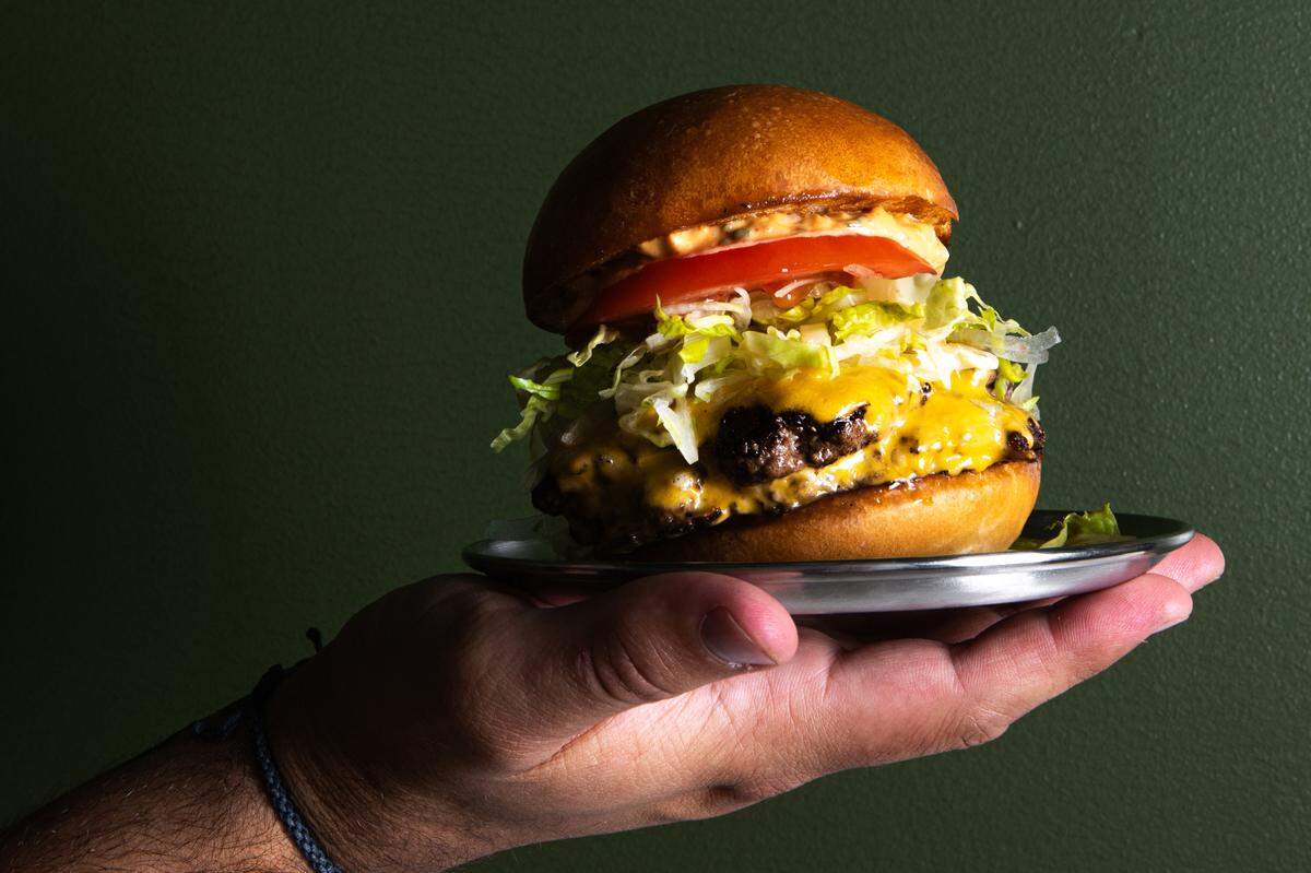 The new Raleigh burger joint LaGana opens this month in Raleigh, serving its version of the classic burger called The Textbook, pictured here.