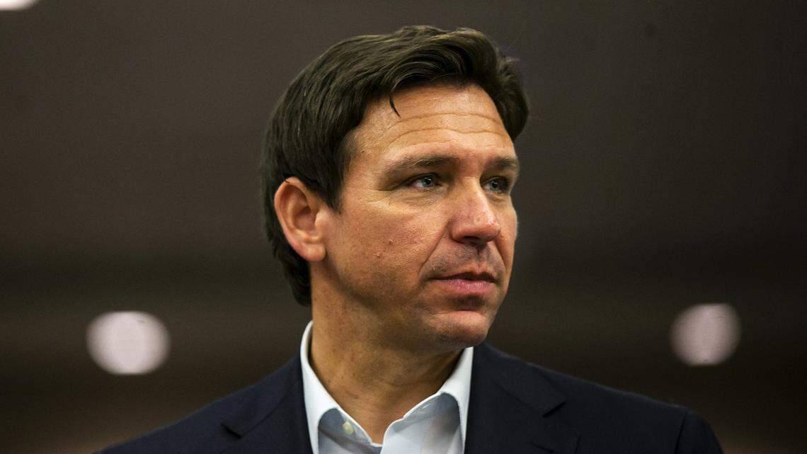Florida Gov. Ron DeSantis greets guests after an Iowa GOP reception, Saturday, May 13, 2023, at The Hotel at Kirkwood Center in Cedar Rapids, Iowa.