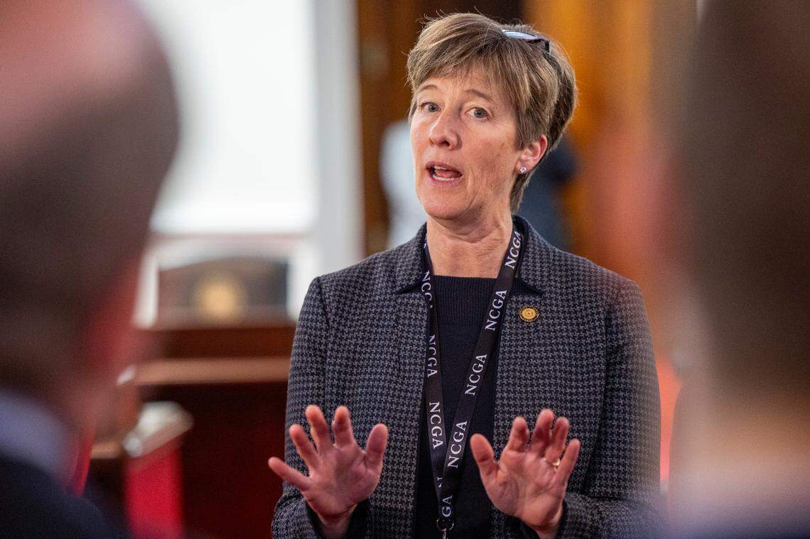 Sen. Julie.Mayfield, a Buncombe County Democrat, speaks with reporters after a Senate session at the Legislative Building on Wednesday, Feb. 26, 2025.