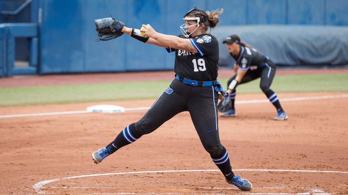 May 30, 2024; Oklahoma City, OK, USA; Duke Blue Devils starting pitcher Cassidy Curd (19) delivers a pitch in the first inning against the Oklahoma Sooners during a Women’s College World Series softball game at Devon Park.