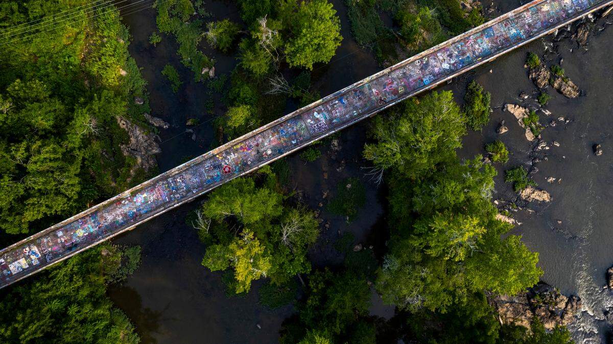 A slug of 1,4-dioxane is likely making its way down the Haw River from Burlingon to Pittsboro, Pittsboro officials announced Friday. This photo shows a bridge on the Haw River.