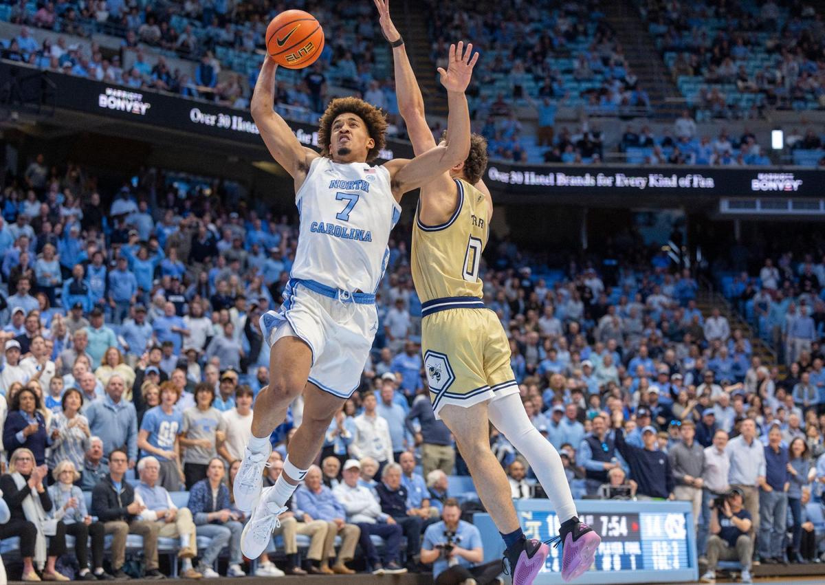 North Carolina guard Seth Trimble (7) drives to the basket against Georgia Tech’s Lance Terry (0) in the first half on Saturday, December 7, 2024 at the Smith Center in Chapel Hill, N.C