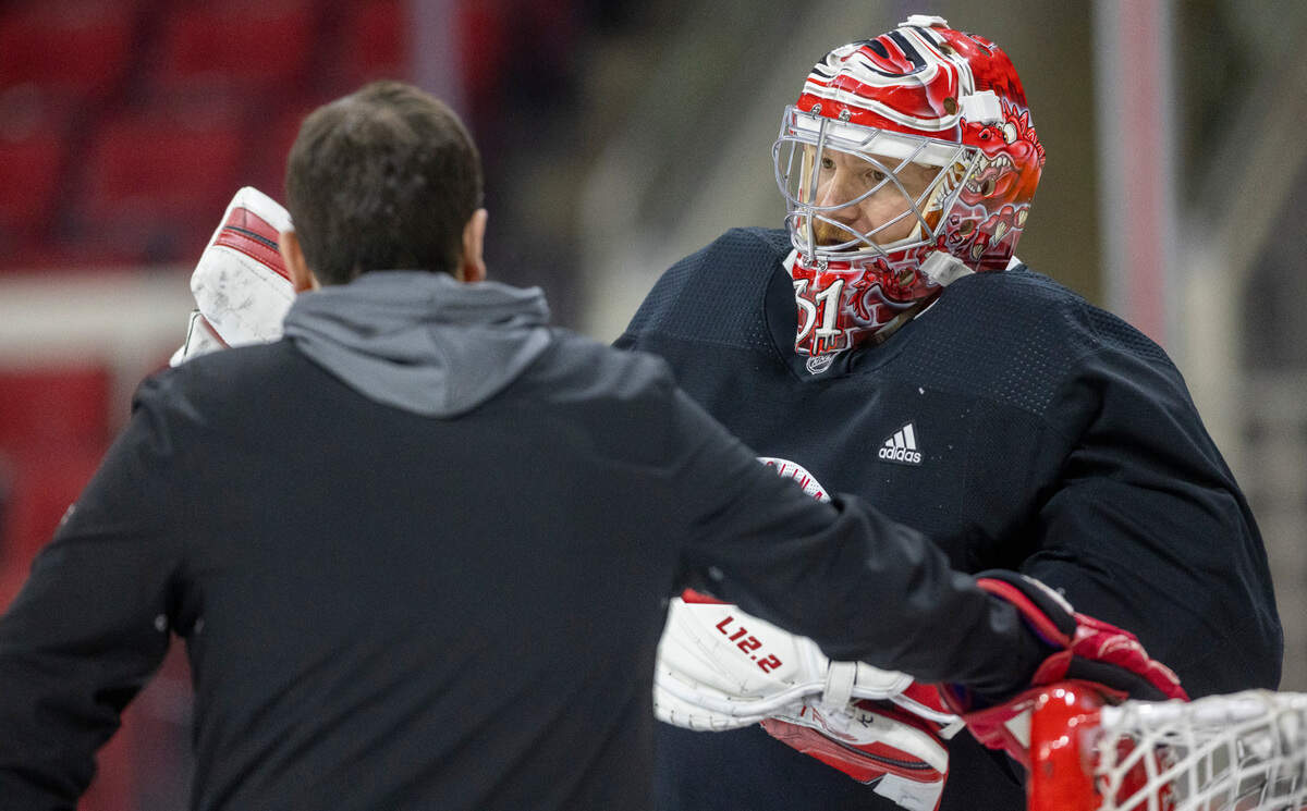 Carolina Hurricanes goalie Frederik Andersen (31) talks with goalie coach Paul Schonfelder during practice on Monday, May 15, 2023 at PNC Arena in Raleigh, N.C.