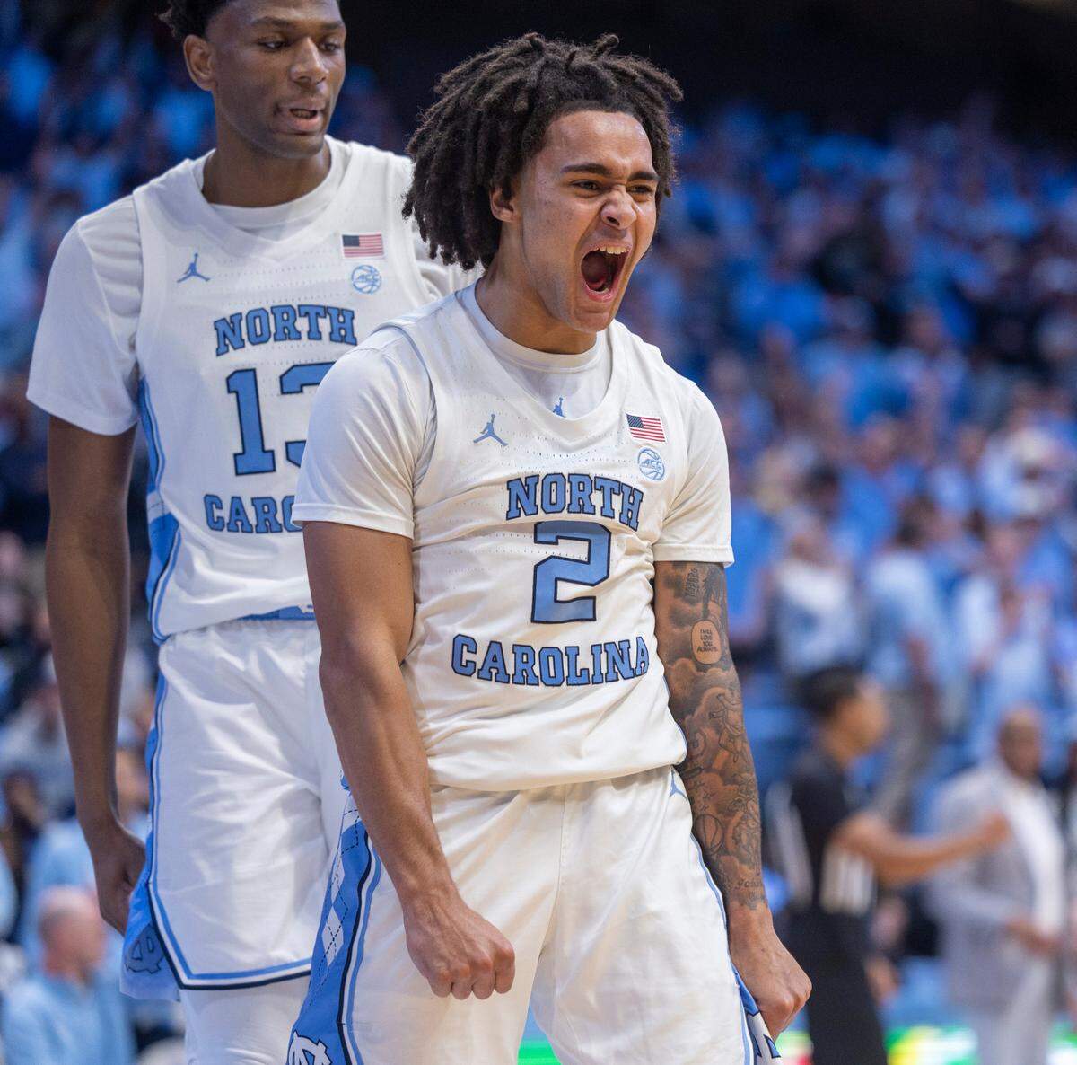 North Carolina’s Elliott Cadeau (2) reacts after making a basket and drawing a foul in the second half against Radford on Monday, November 6, 2023 at the Dean Smith Center in Chapel Hill, N.C.
