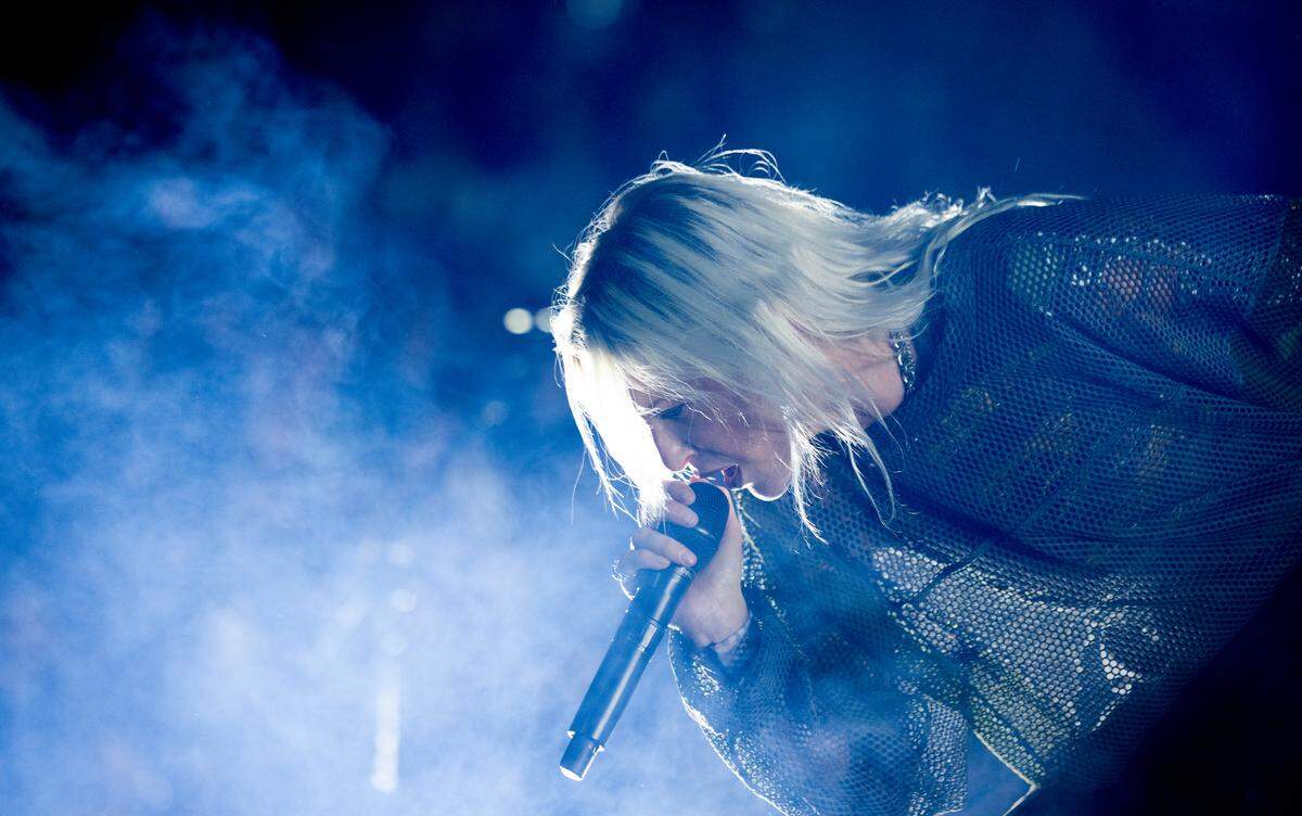 Linkin Park vocalist Emily Armstrong emerges from the fog in concert on their “From Zero World Tour 2025” at Raleigh, N.C.’s Lenovo Center, Tuesday night, May 6, 2025.