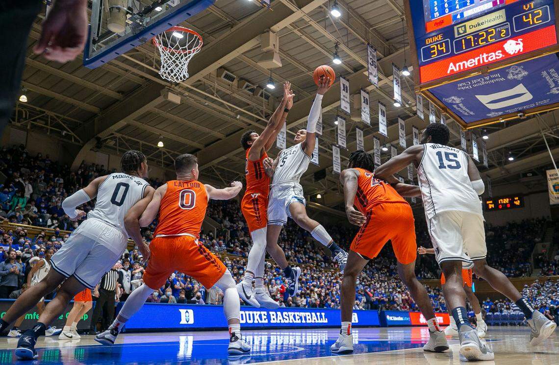 Down by eight points, Duke’s Paolo Banchero (5) drives through heavy traffic to the basket in the second half against Virginia Tech. Paolo scored 17 points in the second half leading the Blue Devils to a 76-65 victory on Wednesday, December 22, 2021 at Cameron Indoor Stadium in Durham, N.C.