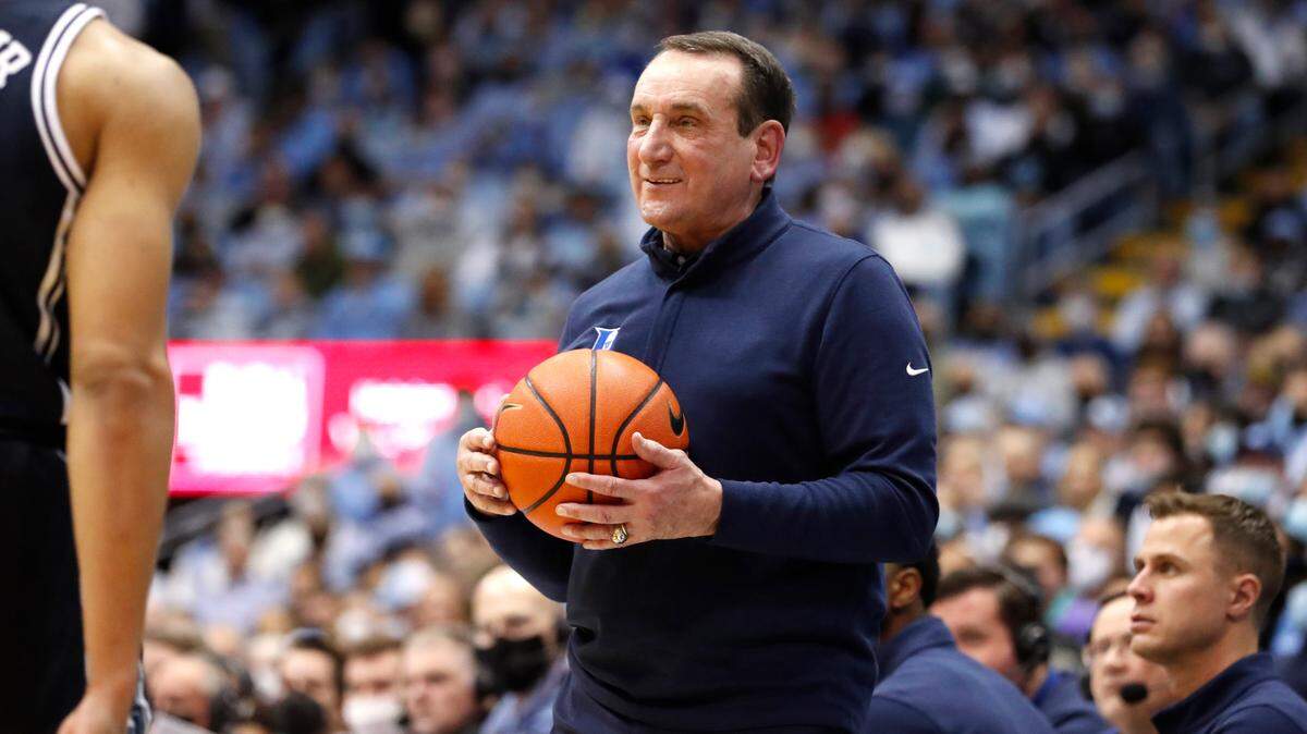 Duke head coach Mike Krzyzewski smiles as he looks to his team during the second half of Duke’s 87-67 victory over UNC at the Smith Center in Chapel Hill, N.C., Saturday, Feb. 5, 2022.