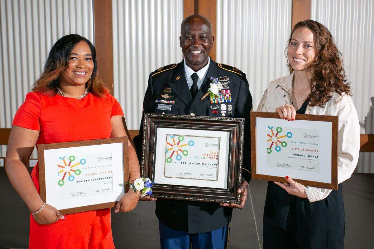 Hillside High School’s First Sgt. Jefferey Matthews, 2023-24 DPS Teacher of the Year, is flanked by finalists Yaritza Prendergast of Neal Middle School and Morandi Hurst of Lakewood Montessori Middle School.