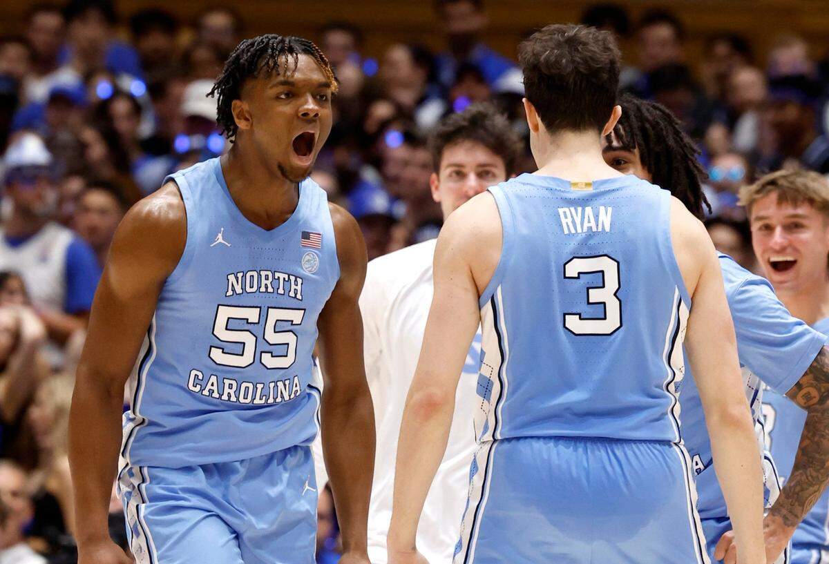 North Carolina’s Harrison Ingram (55) celebrates with Cormac Ryan (3) during the first half of Duke’s game against UNC at Cameron Indoor Stadium in Durham, N.C., Saturday, March 9, 2024.