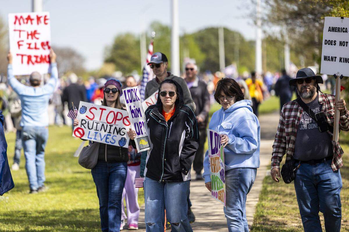 Hundreds of demonstrators line Capital Boulevard in Raleigh on Saturday, March 28, 2026, during a “No Kings” protest against President Donald Trump and his agenda. More than 70 cities and towns across North Carolina participated in nationwide protests Saturday.