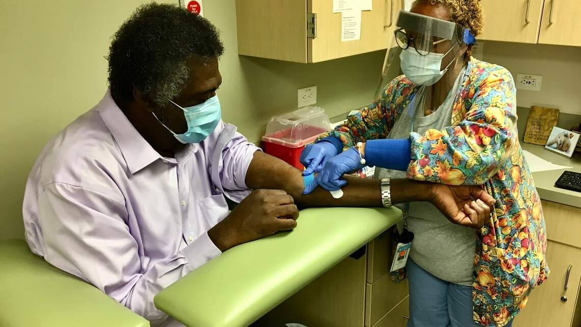 ‘It’s OK to take the vaccine’: Head of nursing group entered trial to alleviate fears