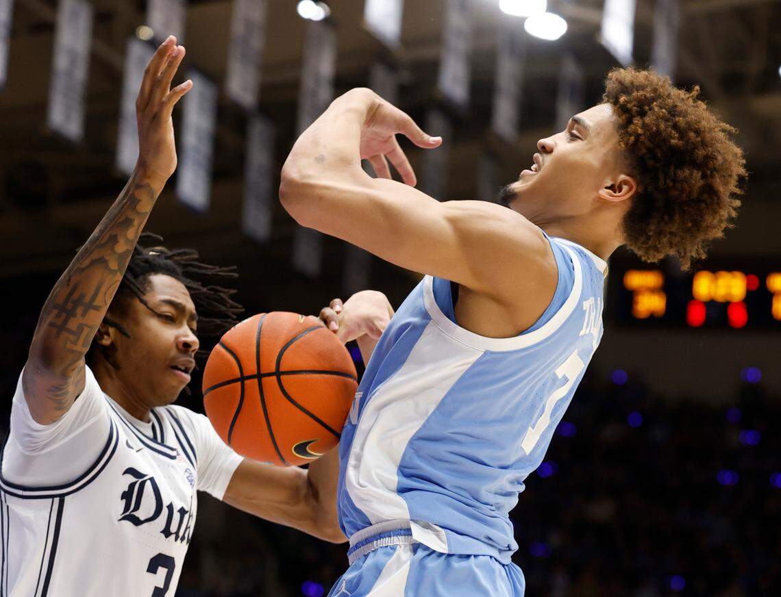 Duke’s Isaiah Evans (3) knocks the ball from North Carolina’s Seth Trimble (7) during the first half of Duke’s game against UNC at Cameron Indoor Stadium in Durham, N.C., Saturday, Feb. 1, 2025.