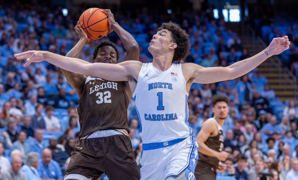 North Carolina’s Zayden High (1) defends Lehigh’s Henri Adiassa (32) in the first half on Sunday, November 12, 2023 at the Smith Center in Chapel Hill, N.C.