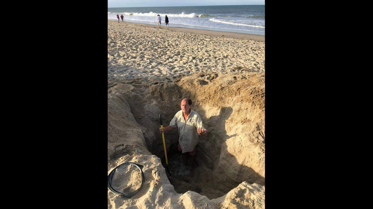 Kill Devil Hills on North Carolina’s Outer Banks warns tourists to stop leaving deep pits in its beaches.
