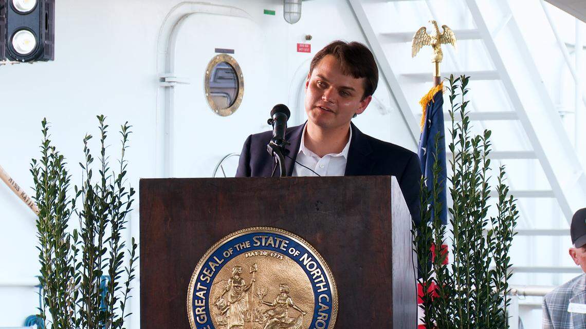 Jordan Hennessy at the christening ceremony for the Miss Katie dredge. Hennessy is a former legislative aide who now oversees the dredge’s operations.
