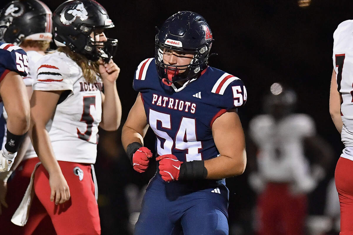 Apex Friendship's Jack Gentile (54) reacts to a play against Rolesville during the first half. The Apex Friendship Patriots and the Rolesville Rams met in  the second round of the  NCHSAA 8A Playoff game in Apex, N.C. on November 14, 2025. Rolesville wins 14-7 in overtime.