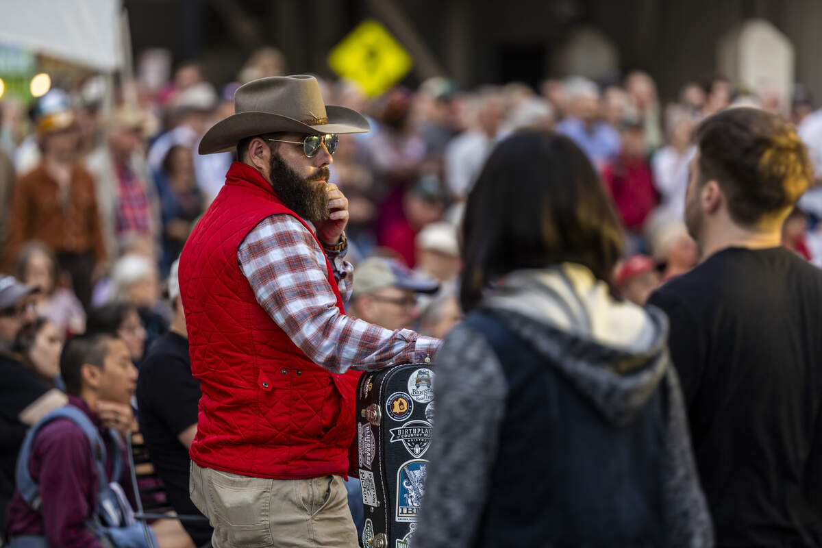Festival-goers enjoy a live performance by the Jason Carter Band in City Plaza during the Raleigh Wide Open music festival in downtown Raleigh on Friday, Oct. 3, 2025. The event features live bluegrass, folk, Americana and gospel artists.