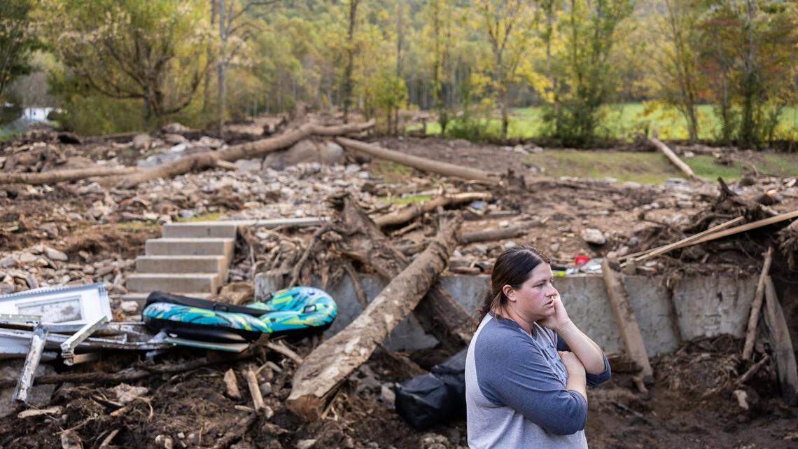 They were in the basement frantically preparing for a flood. Then the landslide hit.