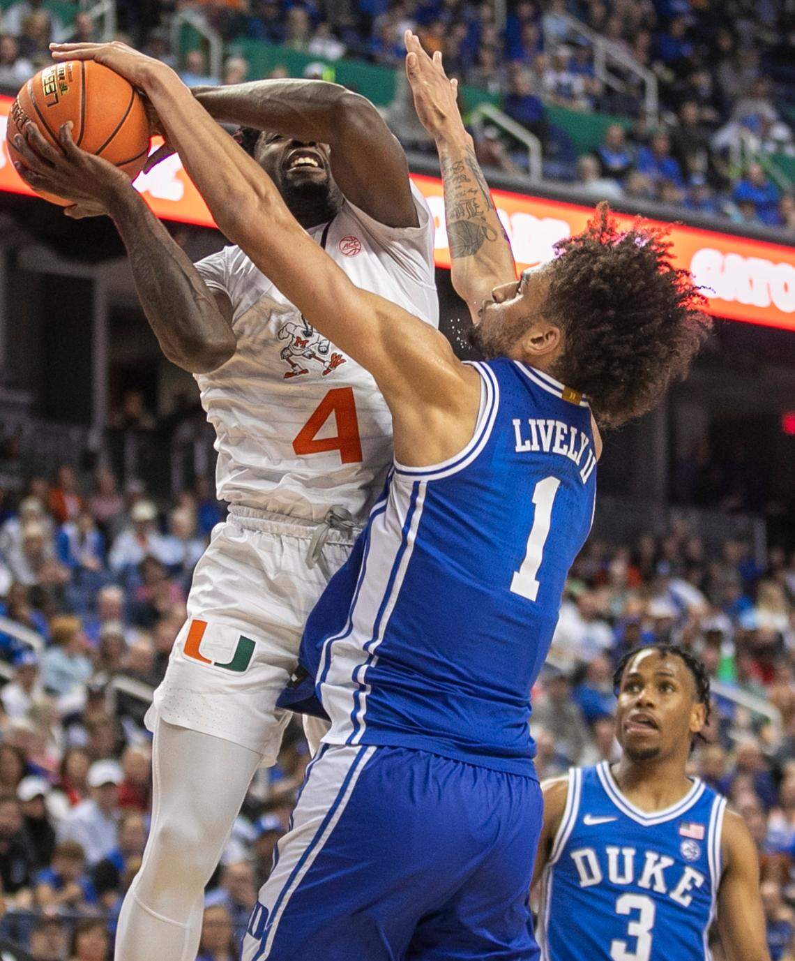 Duke’s Dereck Lively II (1) defends Miami’s Bensely Joseph (4) in the second half during in the semi-finals of the ACC Tournament on Friday, March 10, 2023 at the Greensboro Coliseum in Greensboro, N.C.