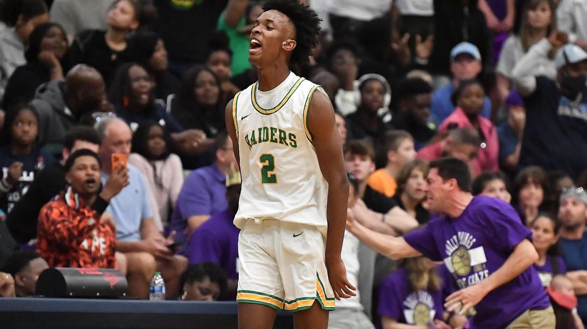 Richmond’s Paul McNeil (2) celebrates after making the last second three-point shot at the end of the first quarter. The Richmond Raiders and the Holly Springs Golden Hawks met in the NCHSAA 4A East Regional Finals in Sanford, N.C. on March 4, 2023.