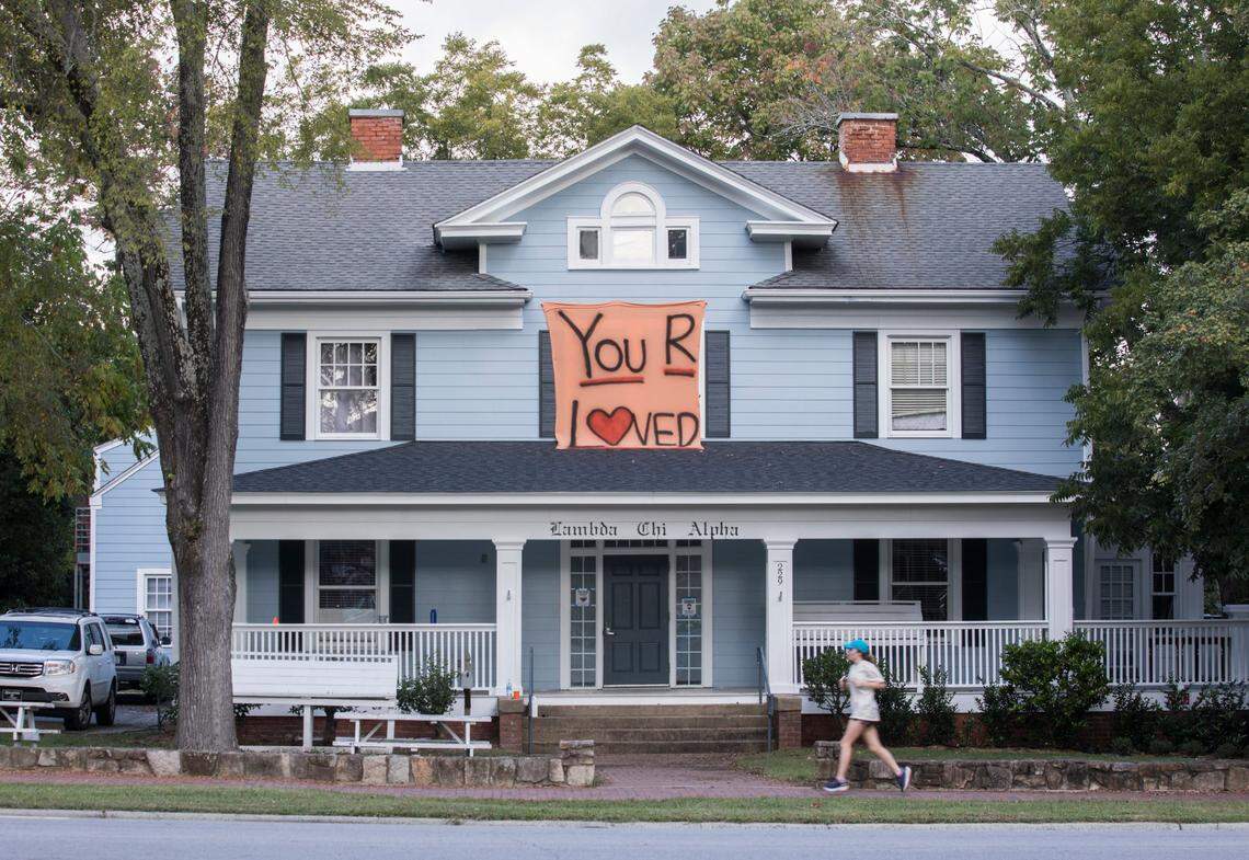 A hand-painted banner hangs from the Lamda Chi Alpha fraternity house on Franklin St. in Chapel Hill, N.C. on Oct. 12, 2021.