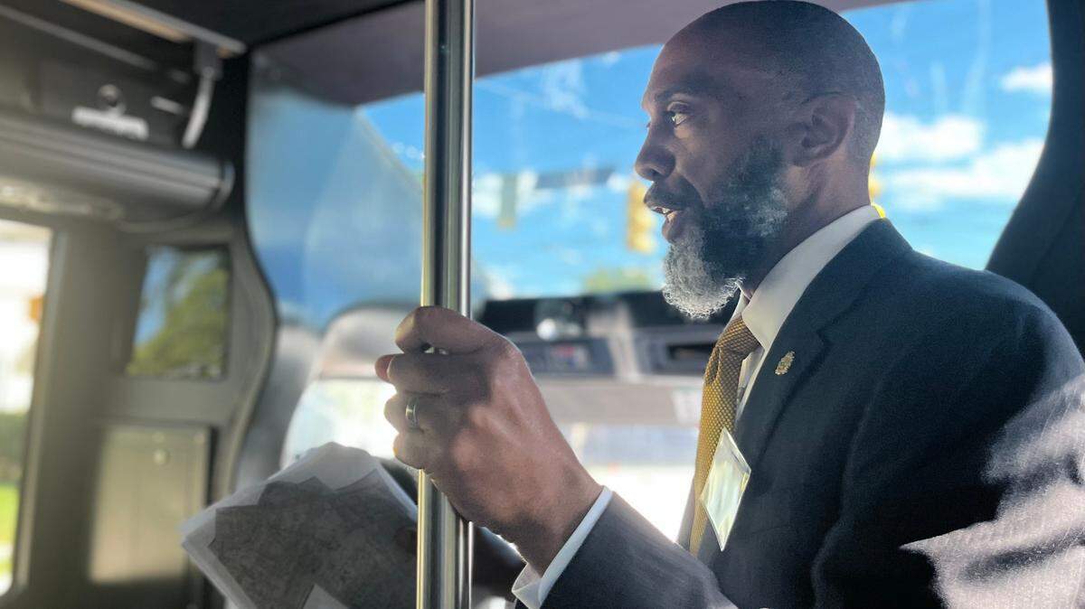 Durham Housing Authority CEO Anthony Scott gives a bus tour of public housing communities downtown on Monday, Sept. 26, 2022.
