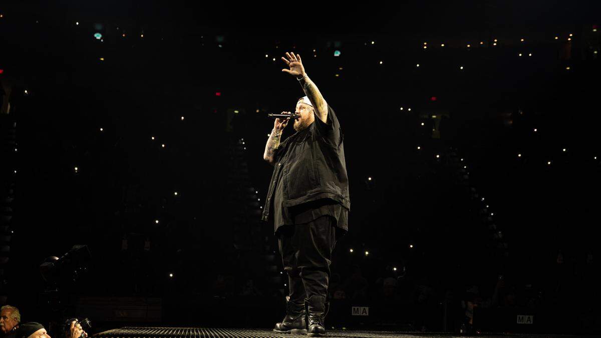Jelly Roll acknowledges the crowd at the Lenovo Center in Raleigh as he opens his show.