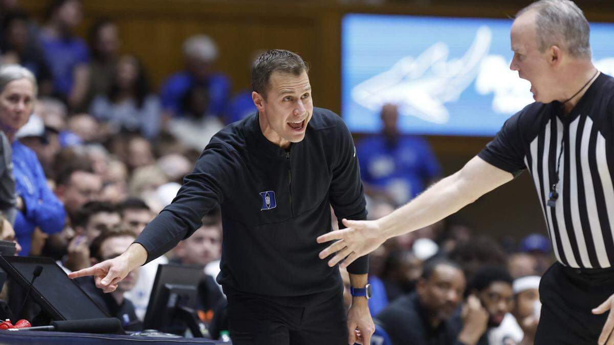 Duke head coach Jon Scheyer asks official John Gaffney to review a call during the first half of Duke’s game against Wake Forest at Cameron Indoor Stadium in Durham, N.C., Tuesday, Jan. 31, 2023.