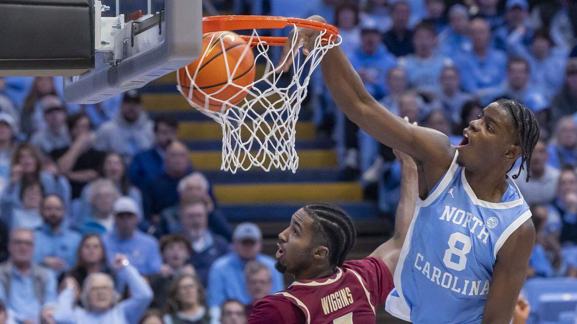 North Carolina forward Caleb Wilson (8) breaks to the basket for a dunk against Florida State forward Chauncey Wiggins (7) in the second half on Tuesday, December 30, 2025 at the Smith Center in Chapel Hill, N.C. Wilson lead all scores with 22 points in the Tar Heels’ 79-66 victory. North Carolina forward Caleb Wilson (8) breaks to the basket for a dunk against Florida State forward Chauncey Wiggins (7) in the second half on Tuesday, December 30, 2025 at the Smith Center in Chapel Hill, N.C. Wilson lead all scores with 22 points in the Tar Heels’ 79-66 victory.