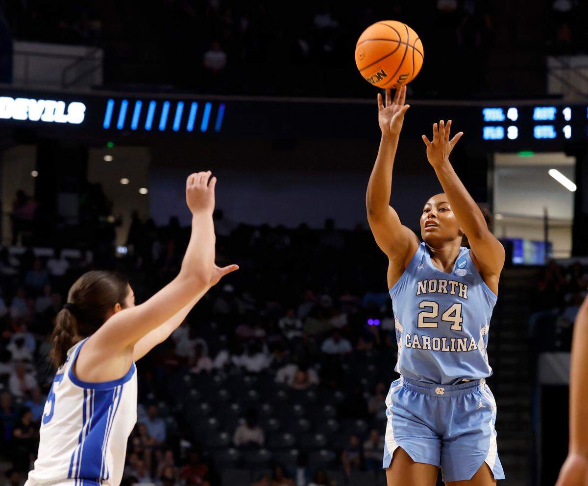 North Carolina’s Indya Nivar shoots over Duke’s Emma Koabel during the first half of the Tar Heels’ 47-38 loss in the Birmingham Regional of the NCAA Tournament at Legacy Arena on Friday, March 28, 2025 in Birmingham, Ala.