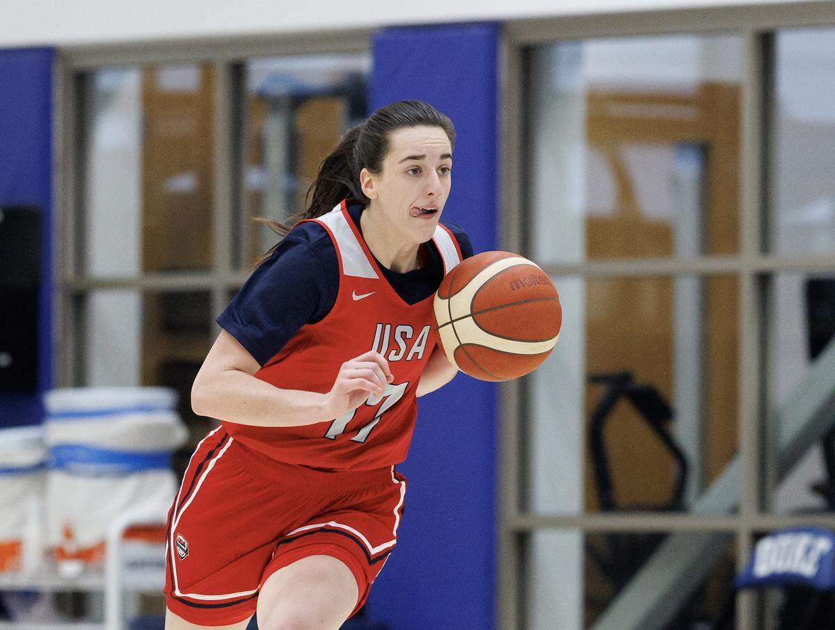 Caitlin Clark pushes the ball up the court during USA Basketball Women’s National Team training camp on Friday, Dec. 12, 2025, at Duke University in Durham, N.C.