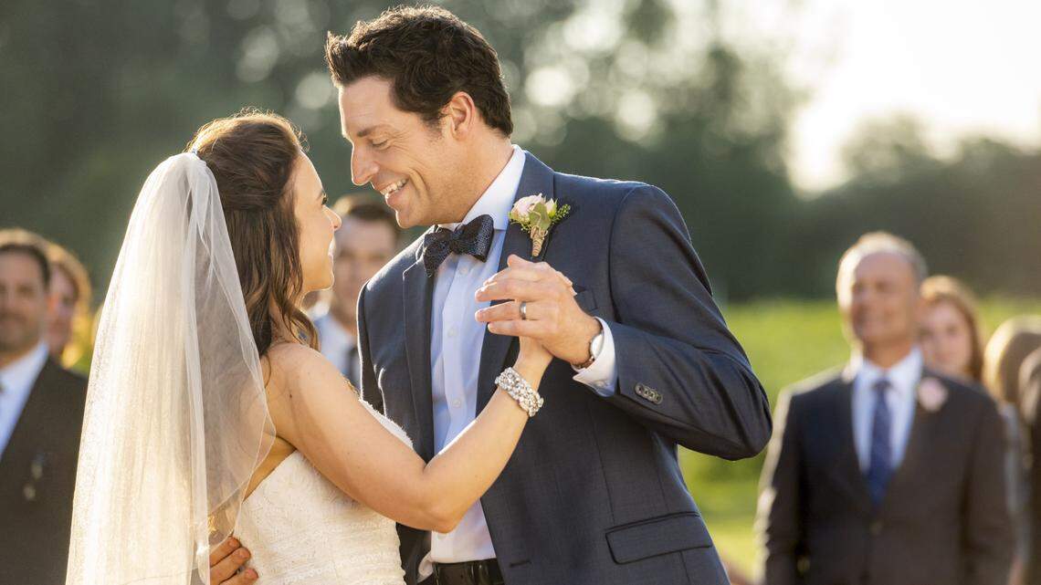 Lacey Chabert, left, and Brennan Elliott in the Hallmark movie “All of My Heart: The Wedding.”