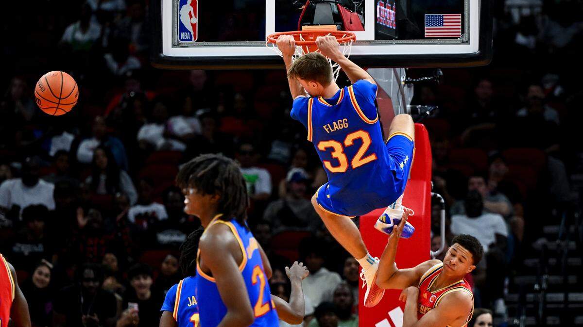 Apr 2, 2024; Houston, TX, USA; McDonald’s All American East forward Cooper Flagg (32) dunks the ball during the second half against the McDonald’s All American East at Toyota Center. 
