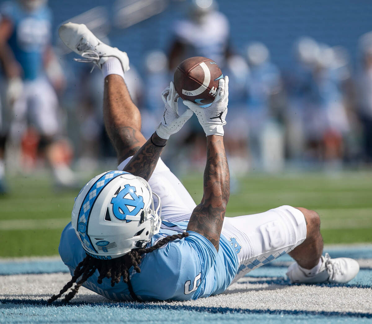 North Carolina receiver Nate McCollum (6) reacts after a touchdown pass from quarterback Drake Maye during the Tar Heels’ spring football game on Saturday, April 15, 2023 at Kenan Stadium in Chapel Hill, N.C