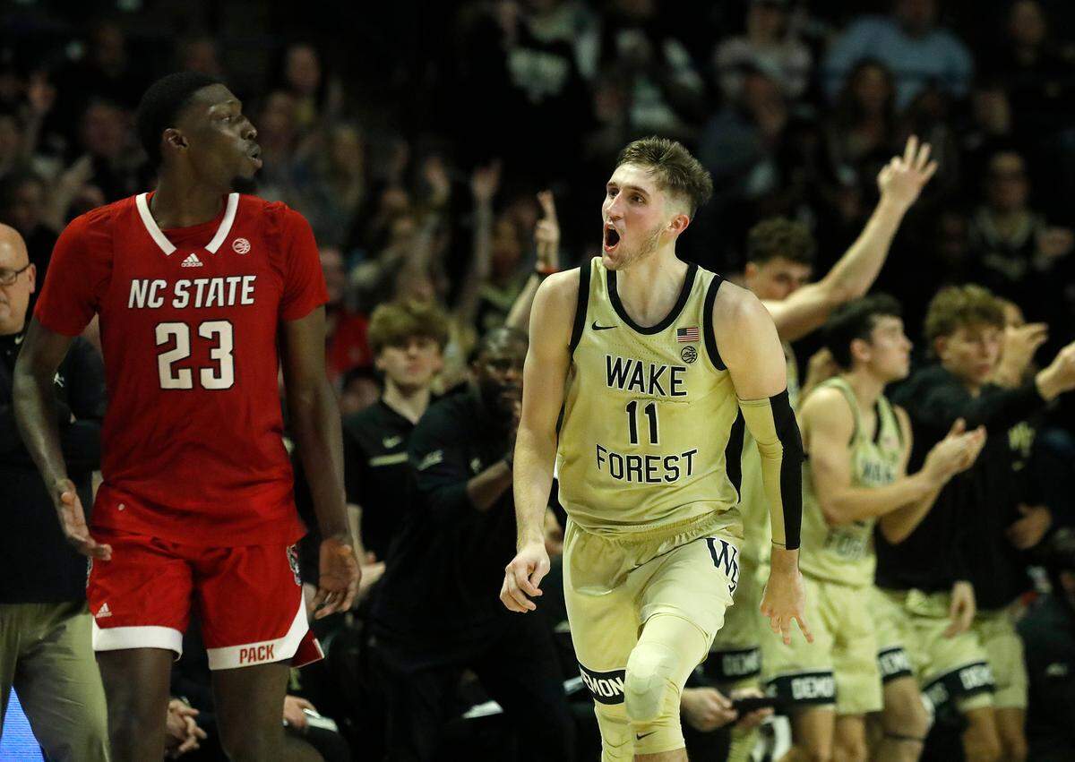 Wake Forest’s Andrew Carr reacts during the second half of the Demon Deacons’ 83-79 win over N.C. State on Saturday, Feb. 10, 2024, at Lawrence Joel Veterans Memorial Coliseum in Winston-Salem, N.C.