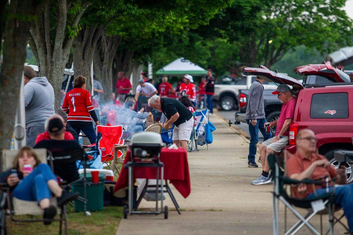 Carolina Hurricanes fans tailgate prior to Game 1 of the Stanley Cup Playoffs against the Nashville Predators at PNC Arena Monday, May 17, 2021.