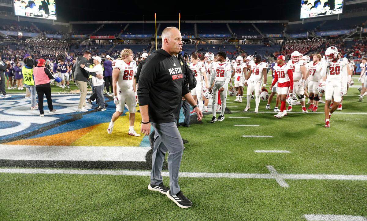 N.C. State head coach Dave Doeren walks off the field after Kansas State’s 28-19 victory over N.C. State in the Pop-Tarts Bowl at Camping World Stadium in Orlando, Fla., Thursday, Dec. 28, 2023.