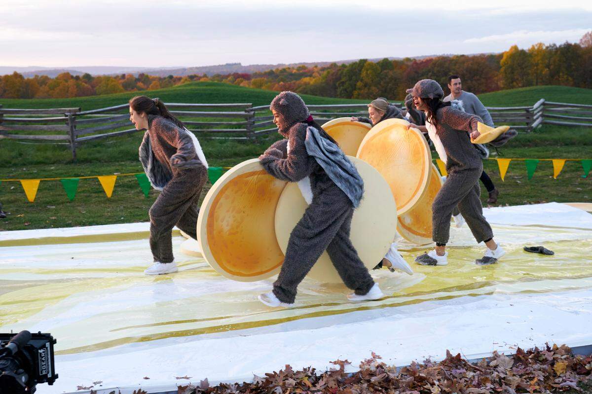 Women dressed in squirrel suits roll acorns during an obstacle course in the Jan. 25, 2021, episode of “The Bachelor,” starring Matt James of Raleigh (not pictured).