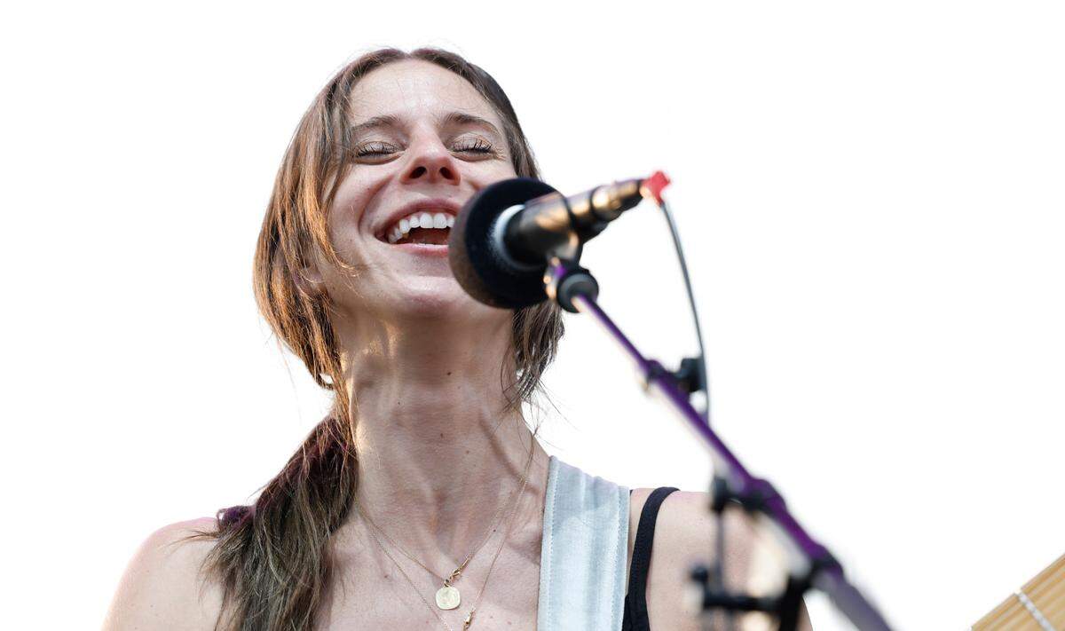 Bully’s Alicia Bognanno sings as they open for the Pixies during a concert at Red Hat Amphitheater in Raleigh, N.C., Friday, June 16, 2023.