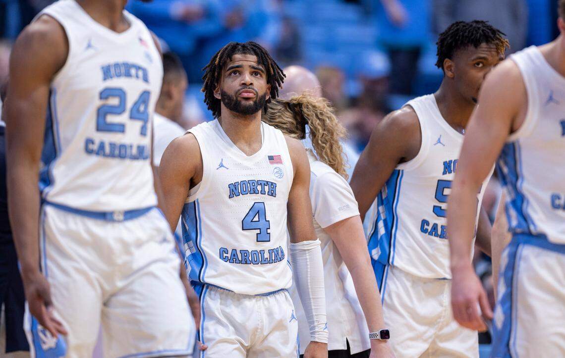 Down by five points with 23 seconds to play, North Carolina’s R.J. Davis (4) glances as the score board following a time out on Tuesday, February 6, 2024 at the Dean E. Smith Center in Chapel Hill, N.C. Clemson defeated North Carolina 80-76, handing the Tar Heels their first home loss of the season.