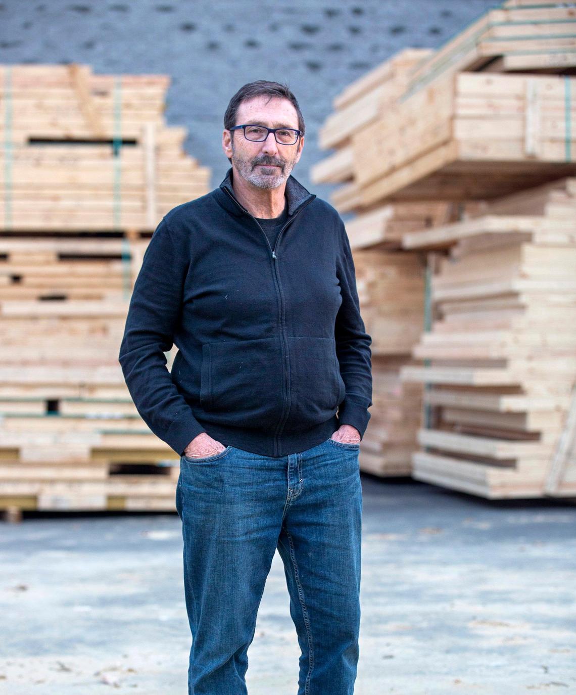 Gregg Warren stands for a portrait outside Beacon Ridge, an affordable housing development providing 120 units for low-income families, in collaboration with the Southeast Raleigh Promise, the YMCA of the Triangle and Wake County Public Schools, which he developed during his 34-year tenure as president of DHIC, on Wednesday, Dec. 11, 2019, in Raleigh, NC. He plans to retire in the spring.