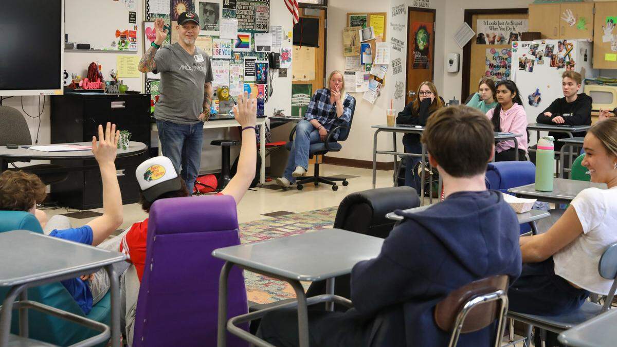 Robert Veeder talks to the students in a class at Penfield High School Tuesday, March 26, 2024.  Veeder killed six people in a DWI accident in North Carolina.  He uses his life story as a warning against drinking and addiction.