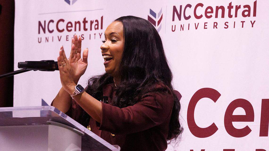 Karrie Dixon smiles while making an eagle motion after being named the new chancellor of North Carolina Central University on Thursday, June 6, 2024, in Durham, N.C.