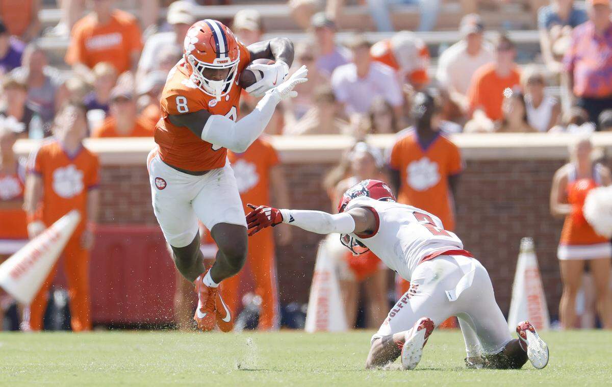 Clemson wide receiver Adam Randall (8) gets past N.C. State cornerback Brandon Cisse (2) during the second half of Clemson’s 59-35 victory over N.C. State at Memorial Stadium in Clemson, S.C., Saturday, Sept. 21, 2024.