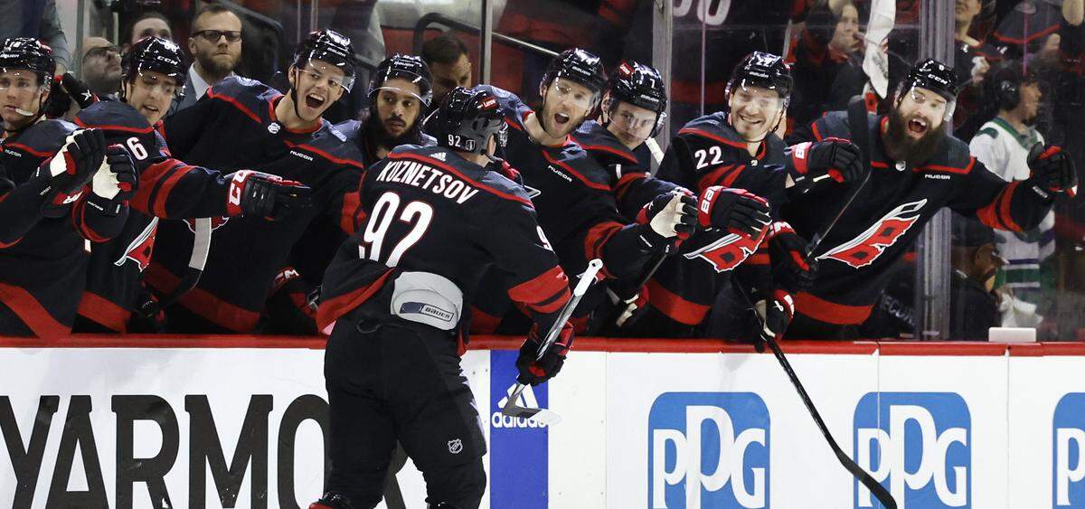 Carolina center Evgeny Kuznetsov (92) is congratulated after he scored the first period of the Hurricanes’ 3-1 victory over the Islanders in the first round of the Stanley Cup playoffs at PNC Arena in Raleigh, N.C., Saturday, April 20, 2024.