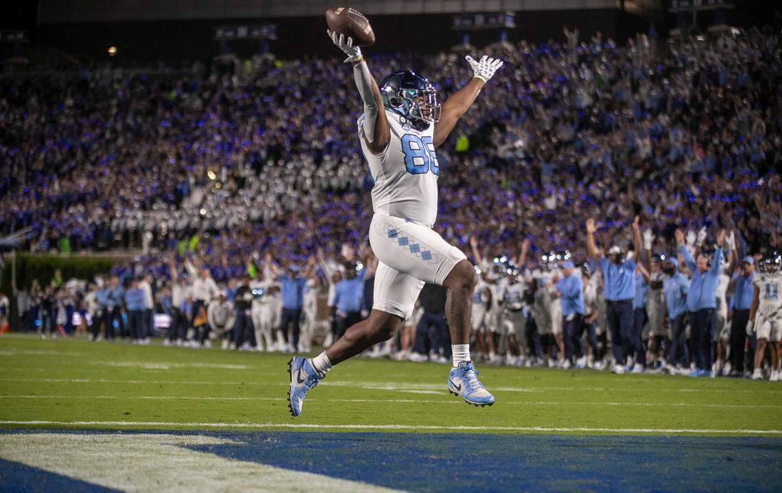 North Carolina’s Kamari Morales (88) reacts after scoring a touchdown on a 10 yard pass from quarterback Drake Maye in the first quarter against Duke on Saturday, October 15, 2022 at Wallace-Wade Stadium in Durham, N.C.