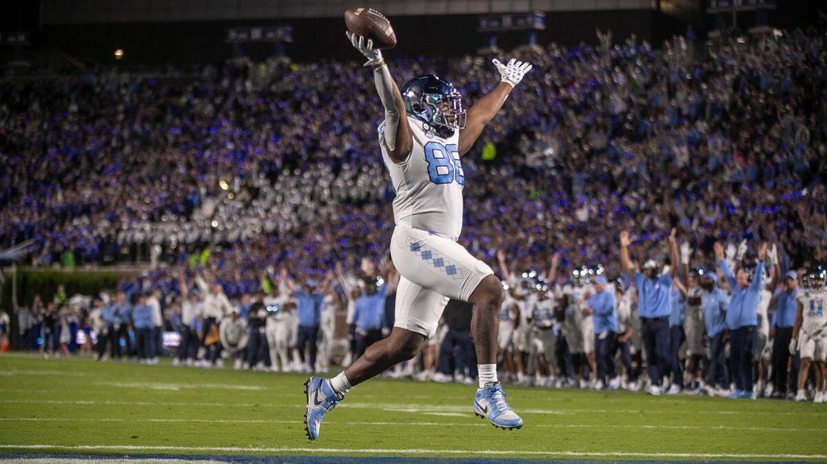 North Carolina’s Kamari Morales (88) reacts after scoring a touchdown on a 10 yard pass from quarterback Drake Maye in the first quarter against Duke on Saturday, October 15, 2022 at Wallace-Wade Stadium in Durham, N.C.