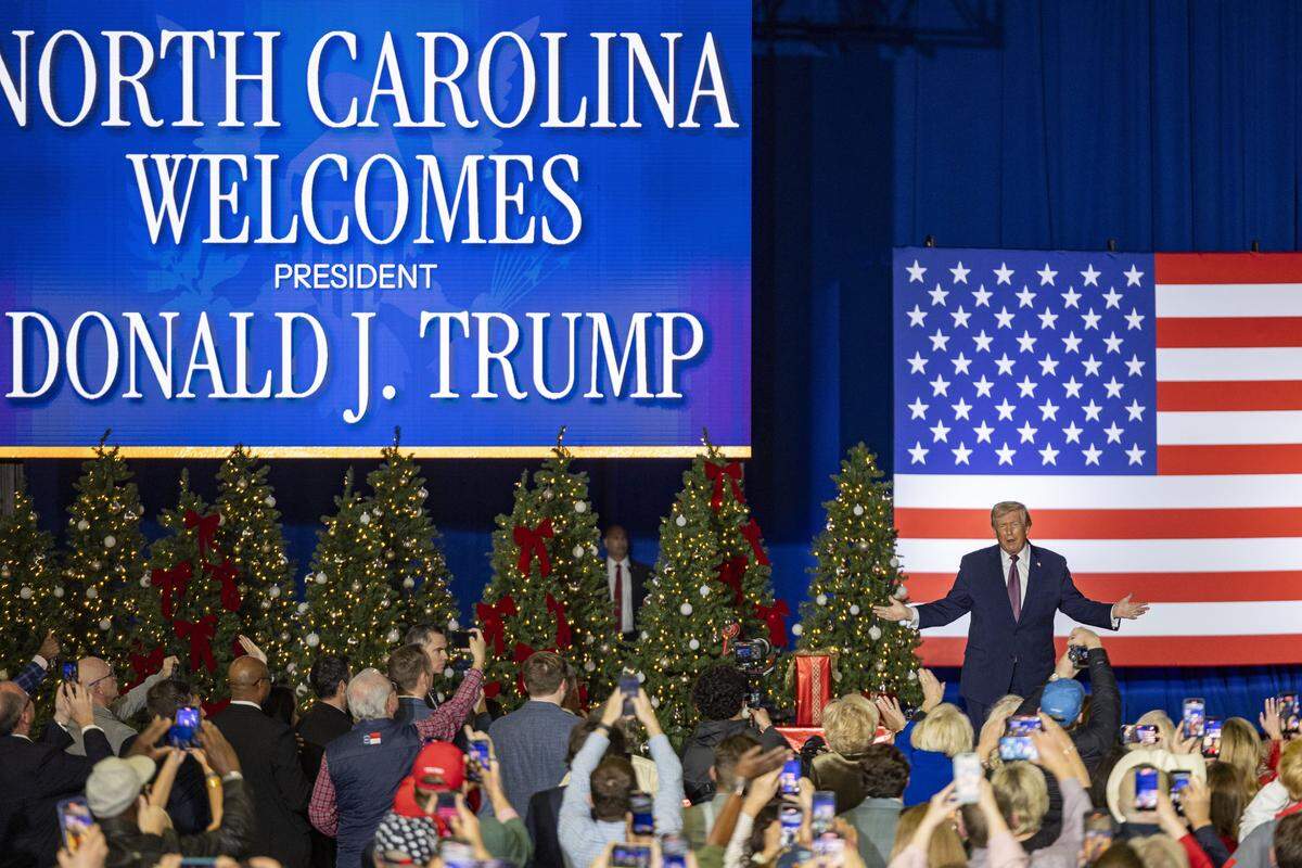 President Donald Trump takes the stage during a rally at the Rocky Mount Event Center in Rocky Mount on Friday, Dec. 19, 2025. 